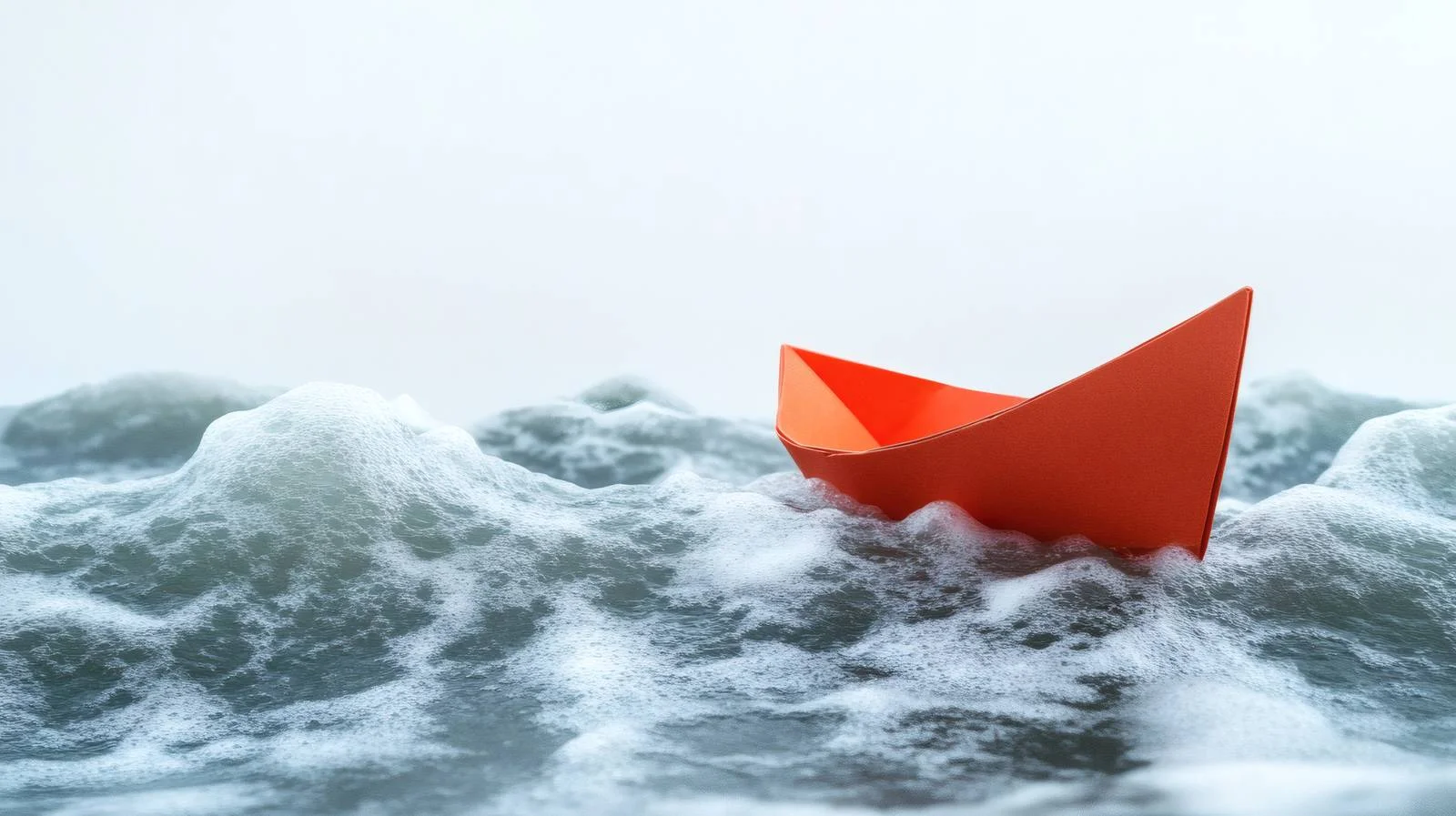 Lonely Paper Boat Amidst Raging Waves — free download from Dotvec