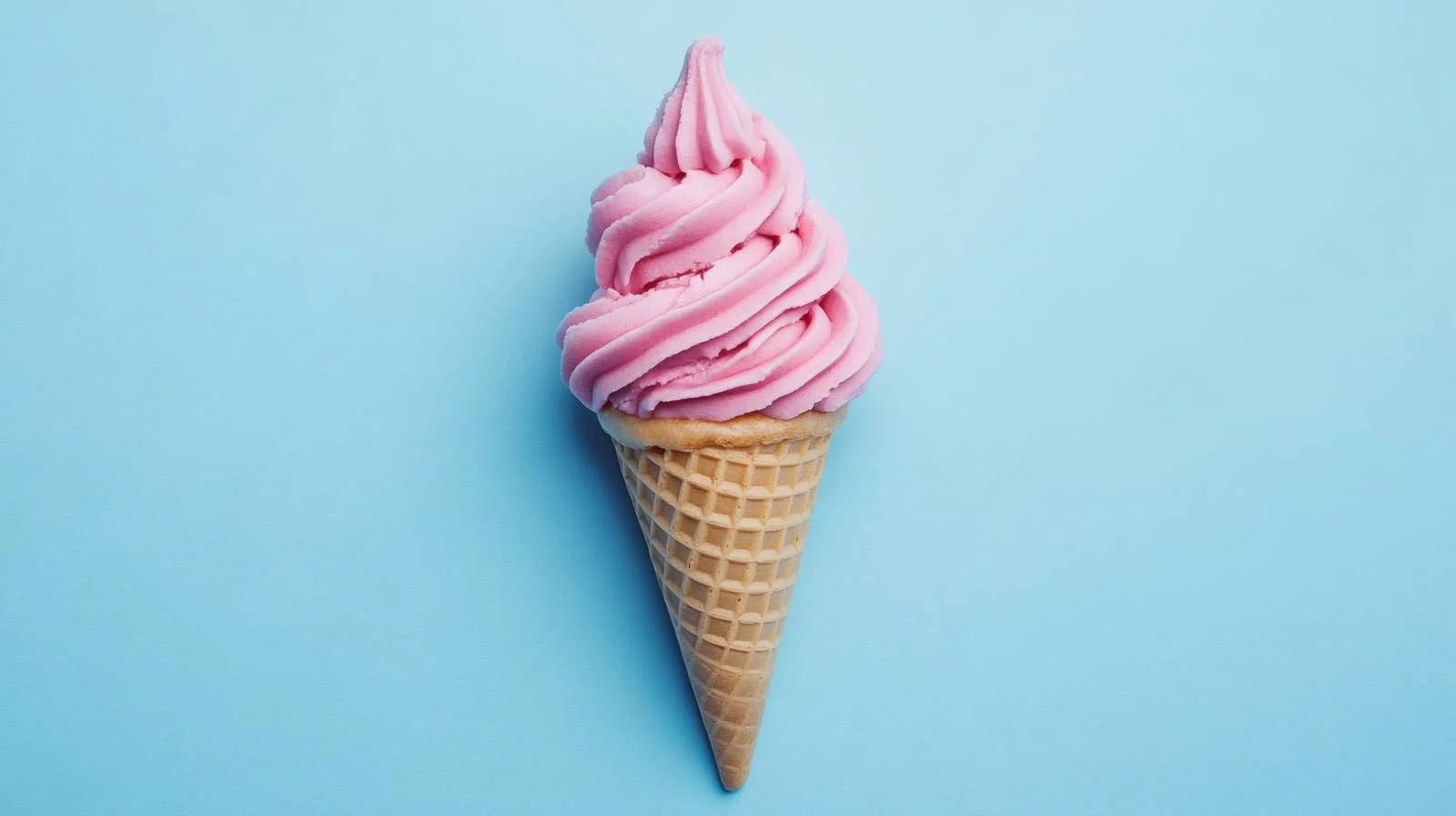 Delicate pink ice cream cone on blue backdrop — free download from Dotvec