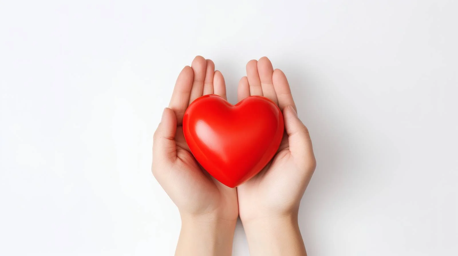 Hands Holding Red Heart on White Background — free download from Dotvec