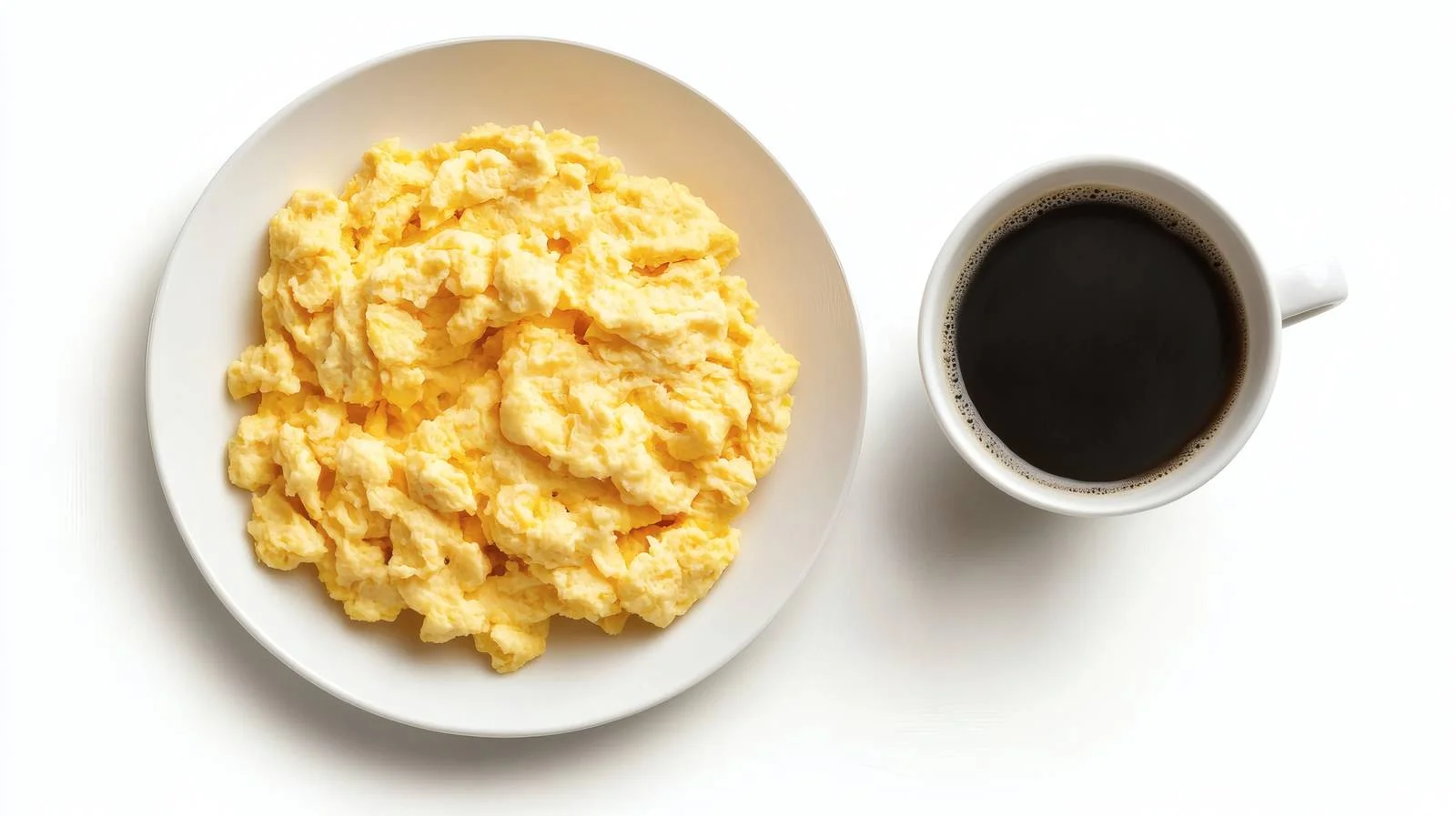 Delicious Scrambled Eggs and Coffee on White — free download from Dotvec