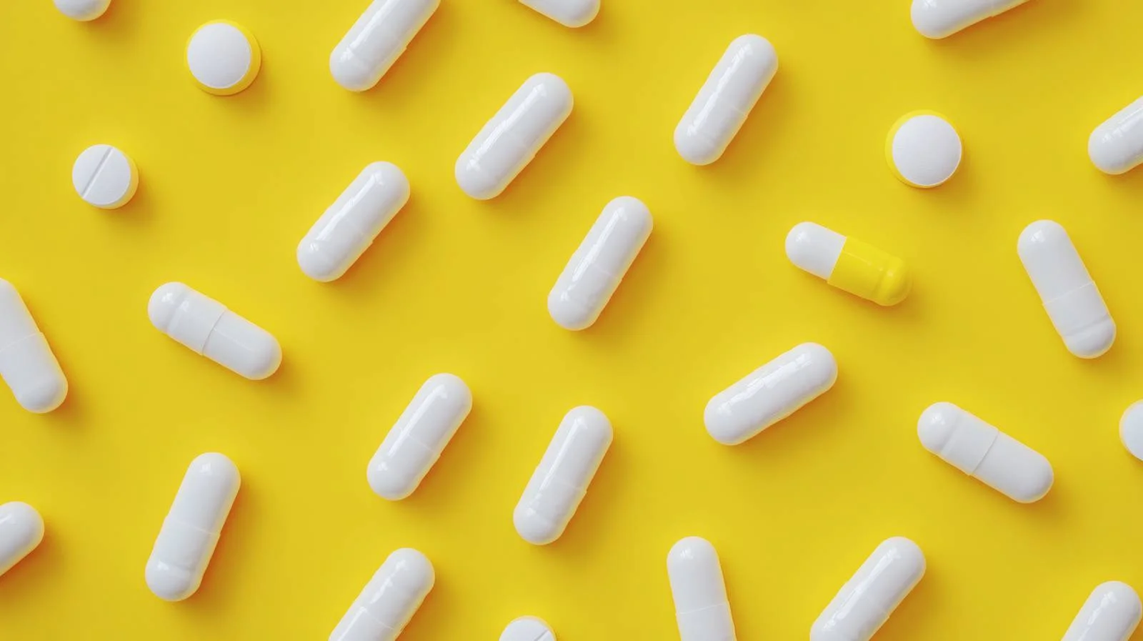Clinical Capsules on Bright Yellow Background — free download from Dotvec