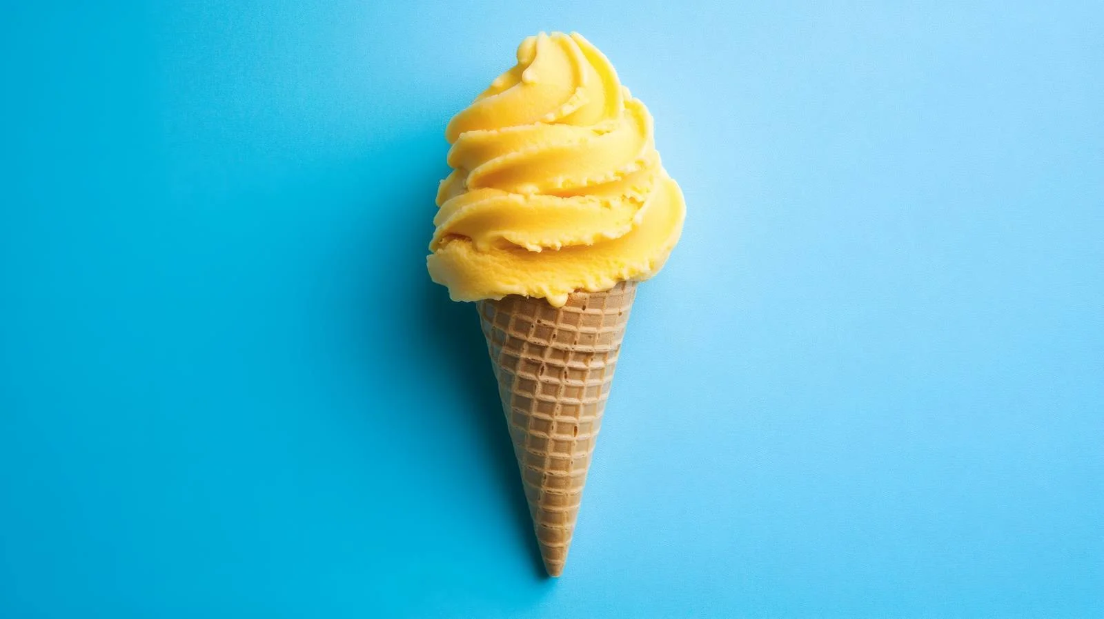 Vibrant Yellow Ice Cream on Blue — free download from Dotvec