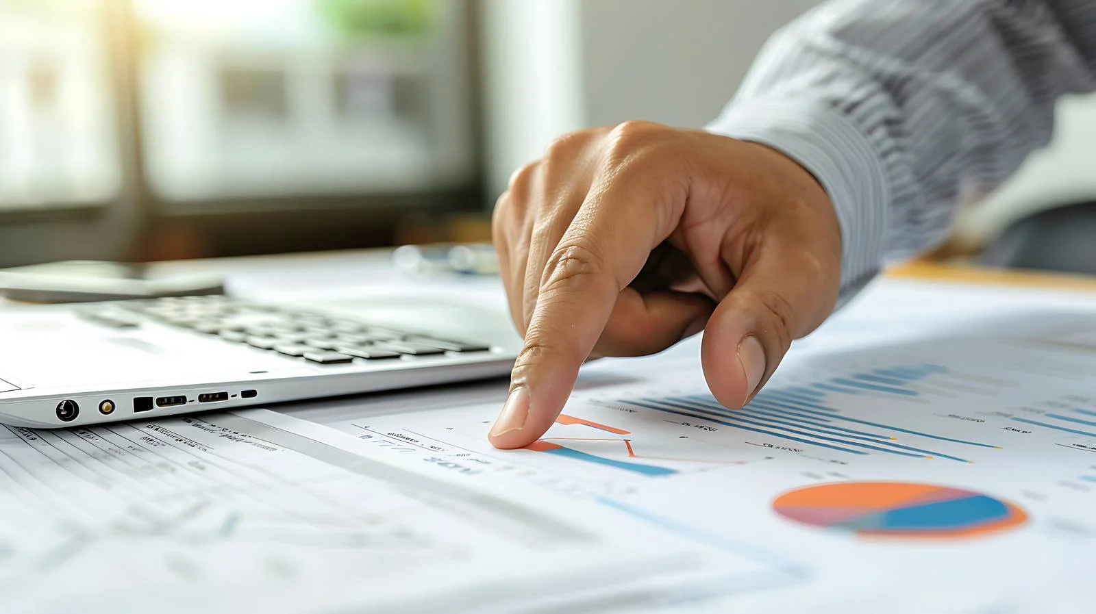 Accountant Pointing to Company Data — free download from Dotvec