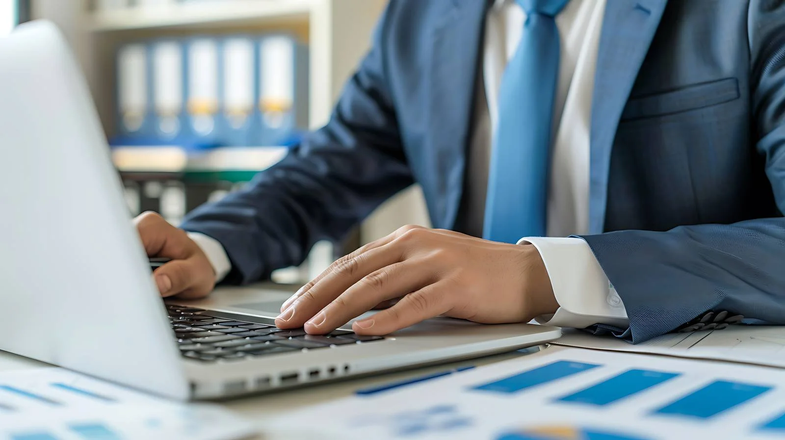 Professional Accountant Working on Laptop — free download from Dotvec