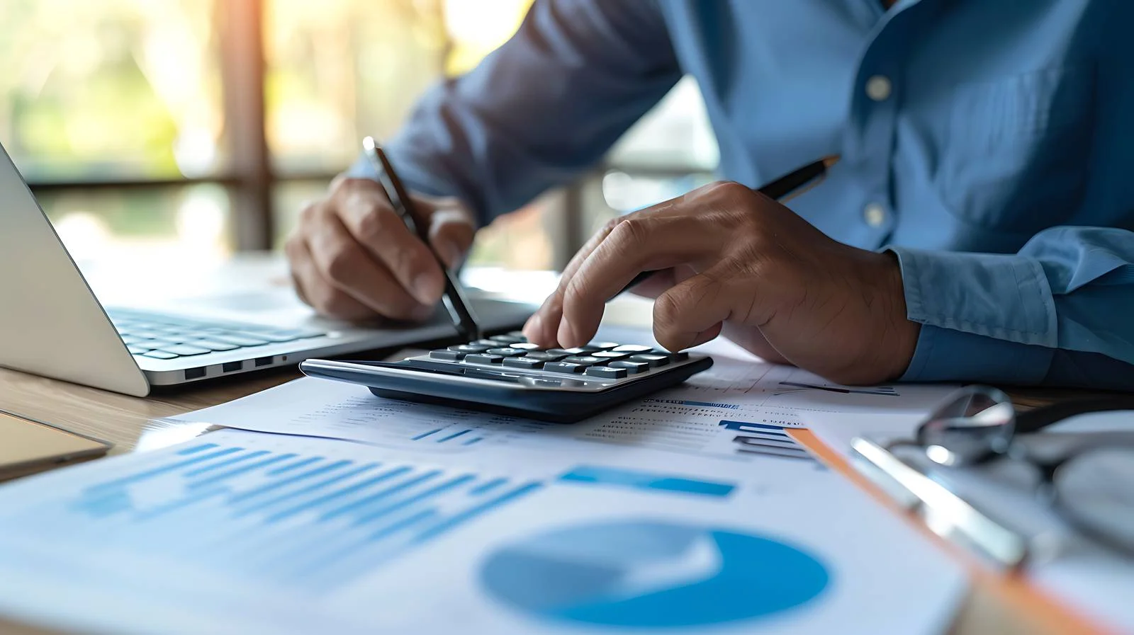 Accountant Using Calculator for Calculation — free download from Dotvec