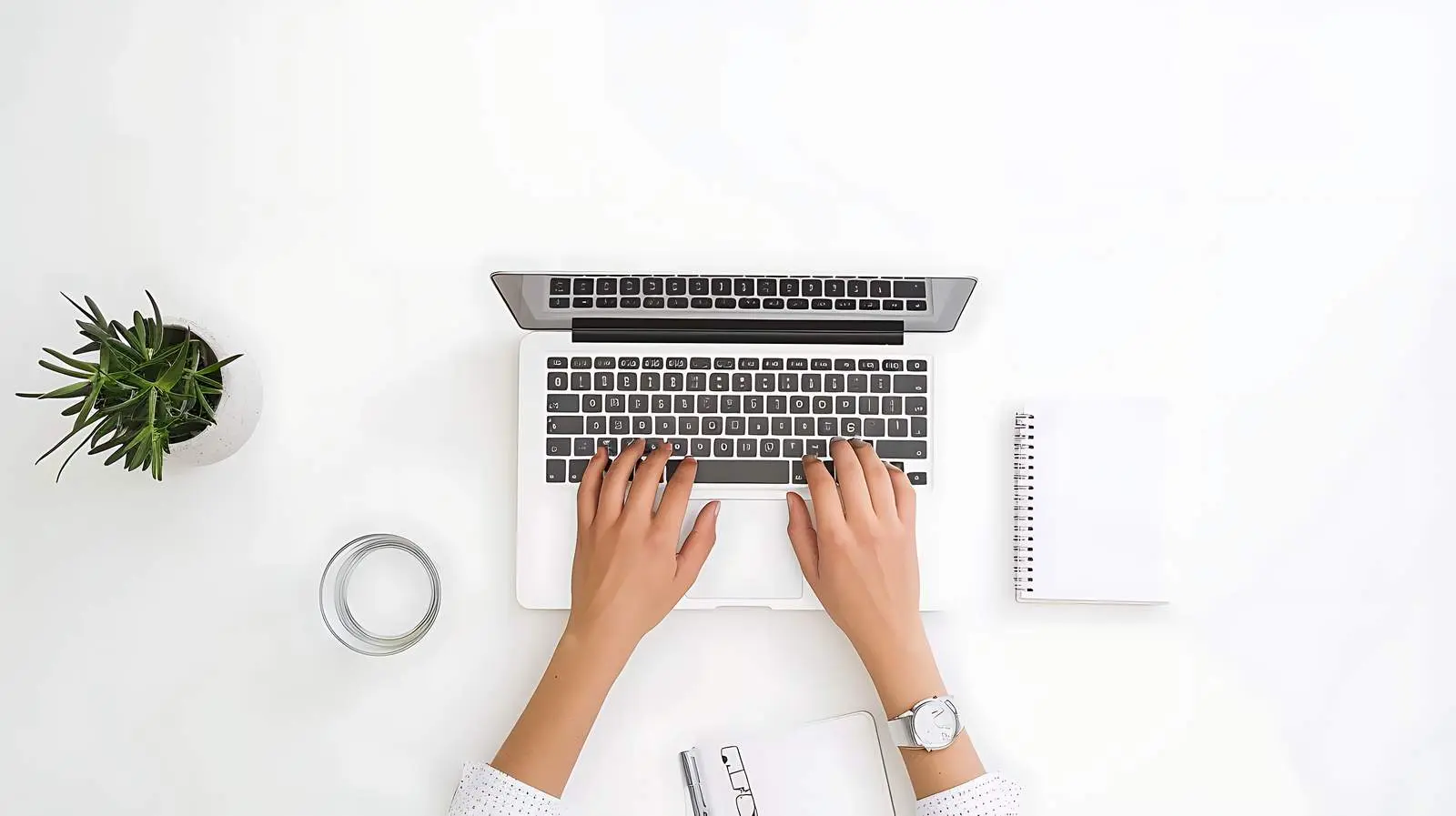 Minimalist Home Office Workspace with Person Working — free download from Dotvec