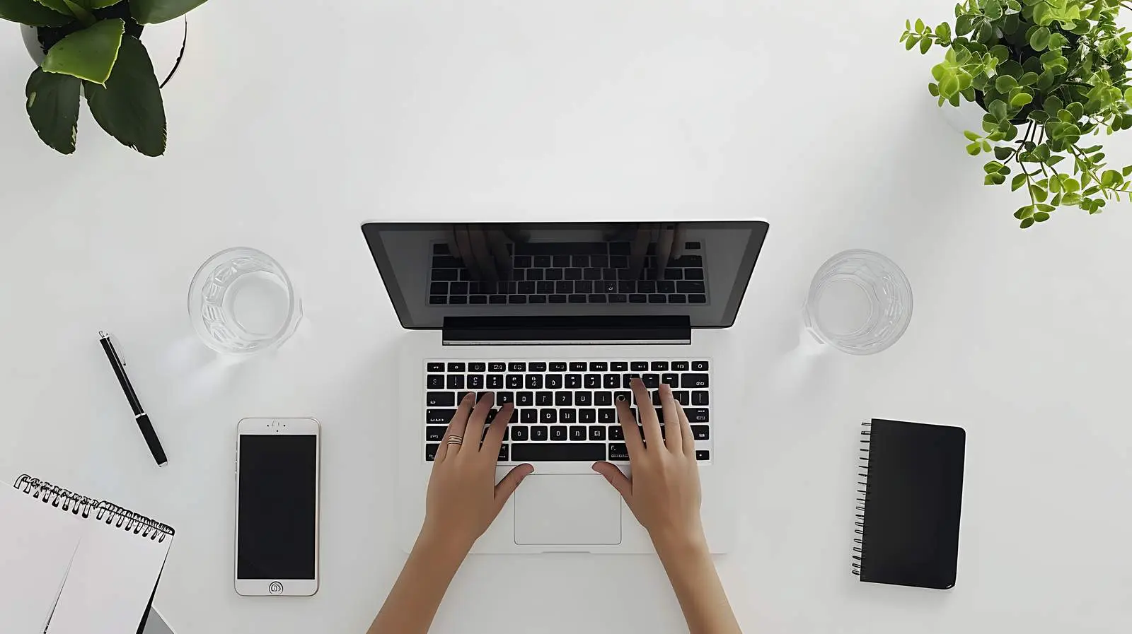 Minimalist Home Office Workspace with Person Working — free download from Dotvec