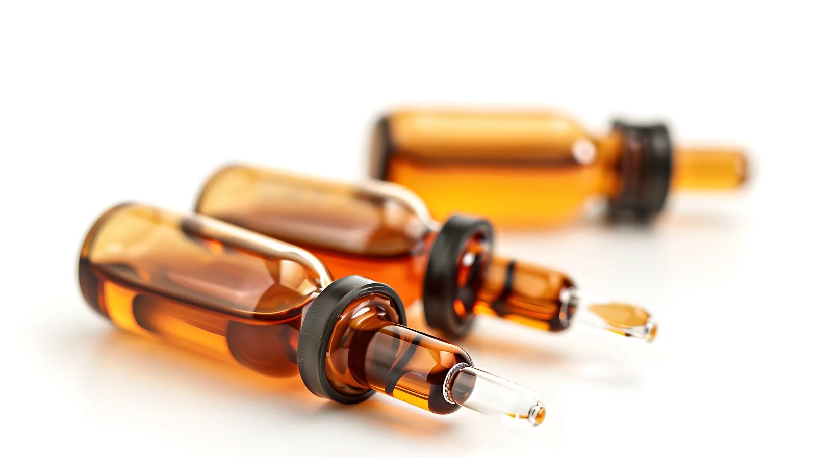 Medical Ampules Closeup on Brown Background — free download from Dotvec