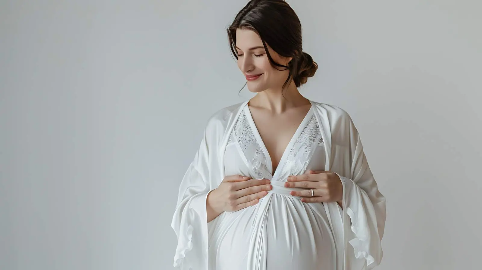 Happy Pregnant Woman in Elegant White Robe — free download from Dotvec