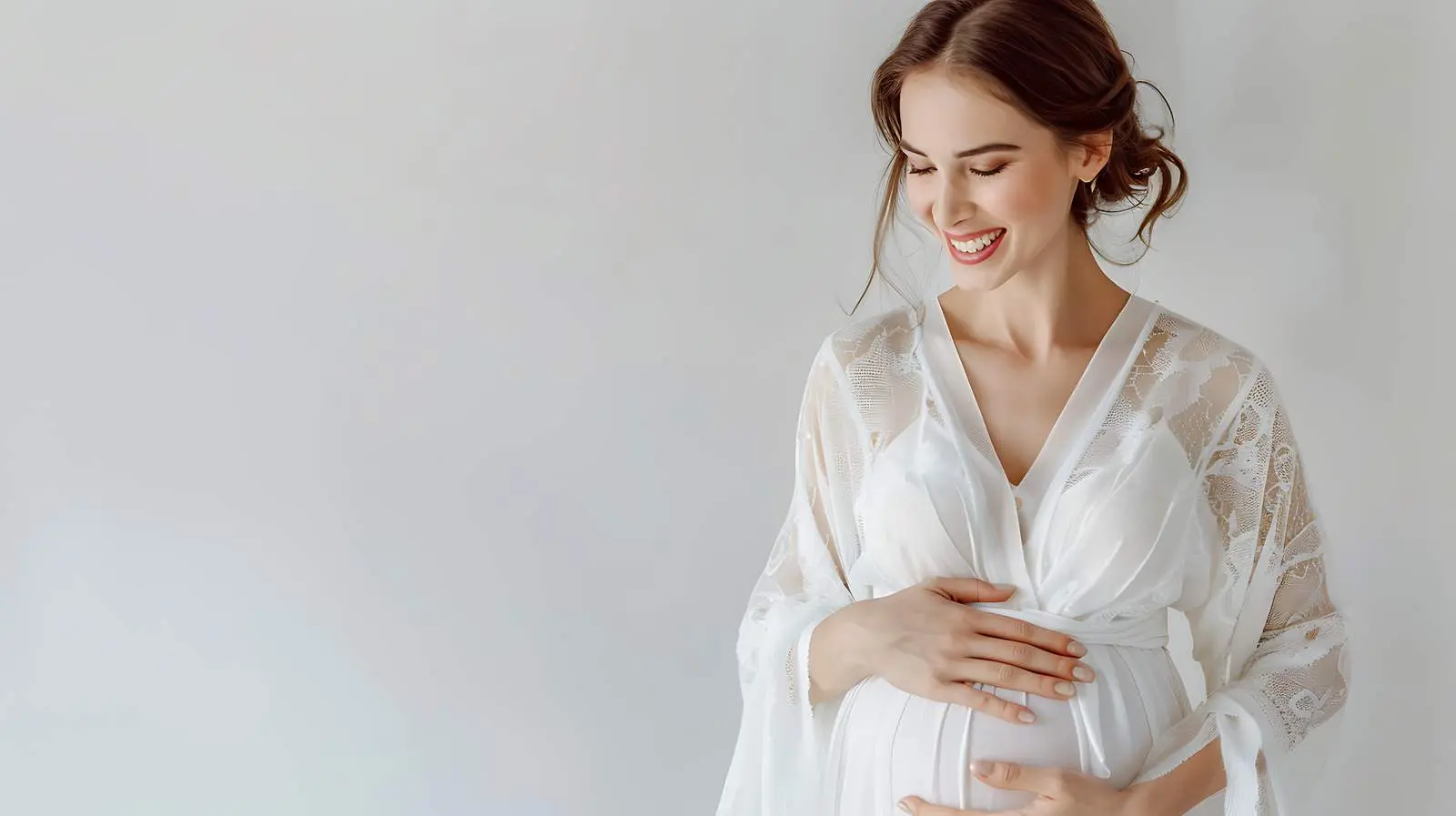 Happy Pregnant Woman in Elegant White Robe — free download from Dotvec