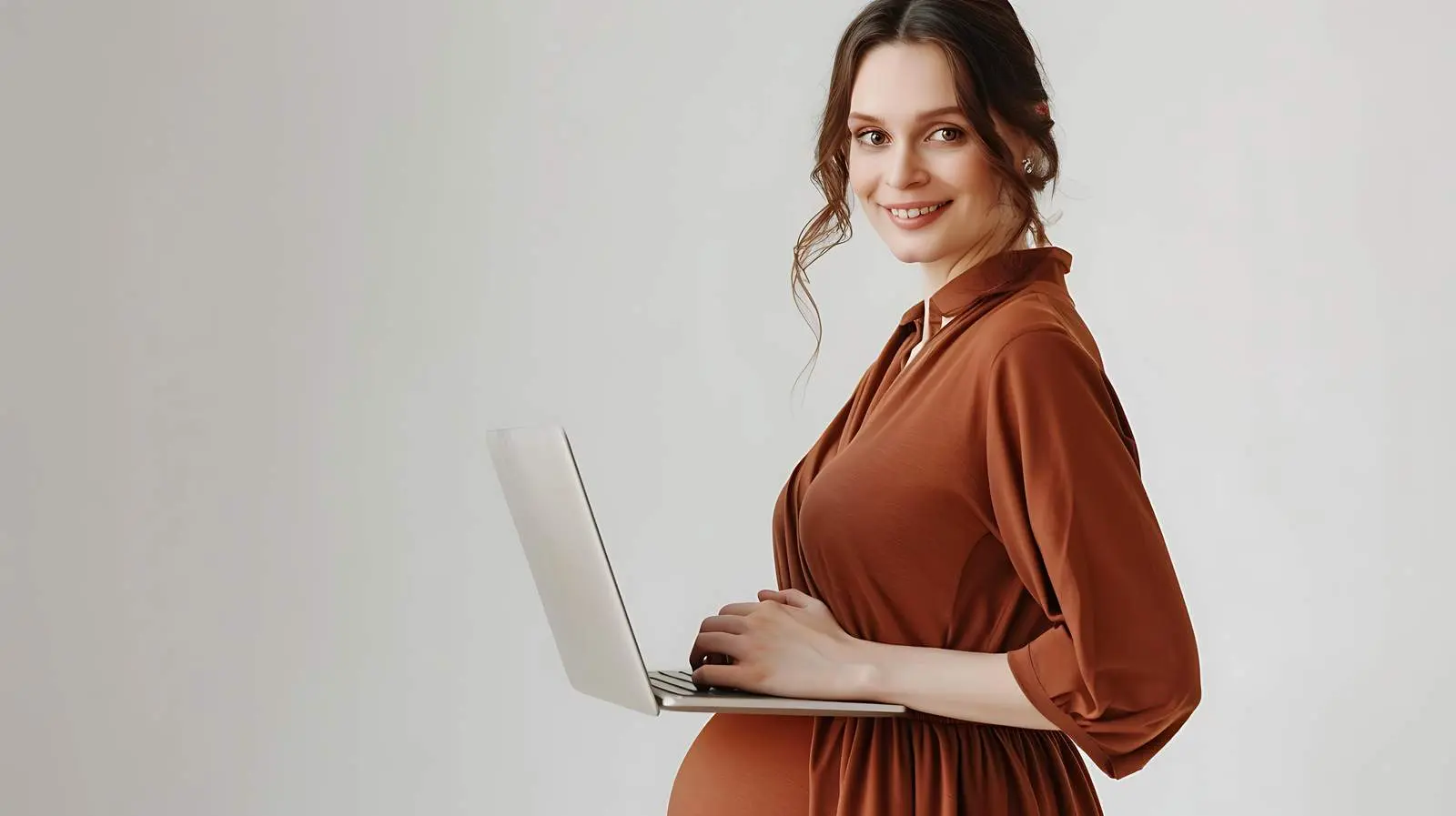 Pregnant Woman in Brown Dress with Laptop — free download from Dotvec