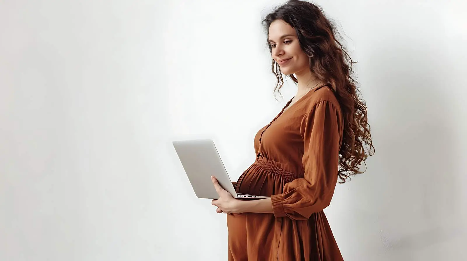 Pregnant Woman in Brown Dress with Laptop — free download from Dotvec