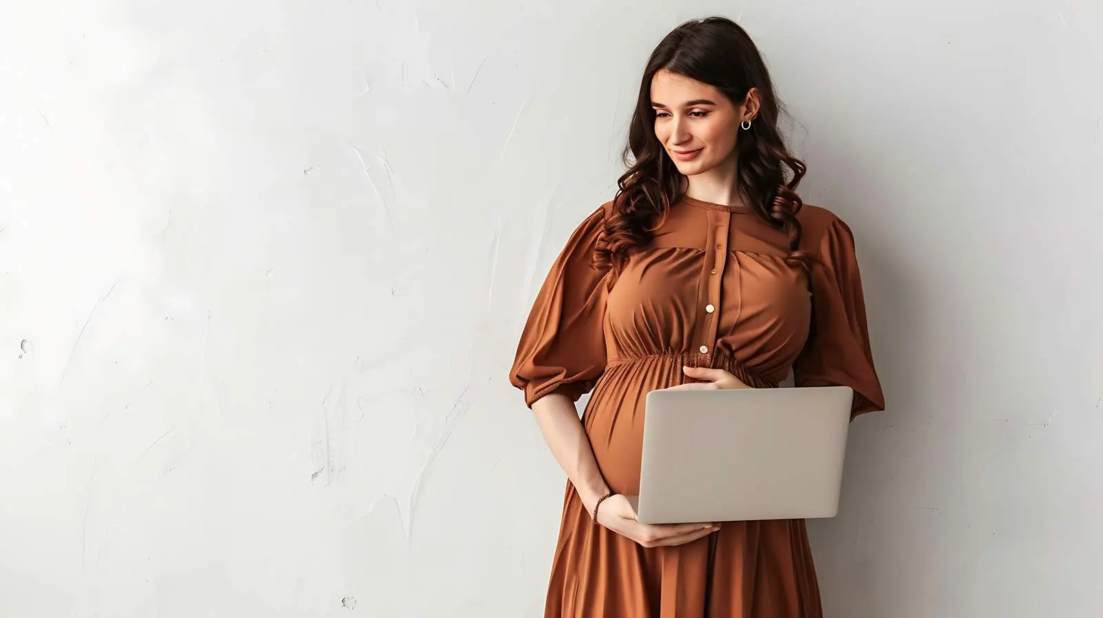 Young Pregnant Woman Working on Laptop — free download from Dotvec