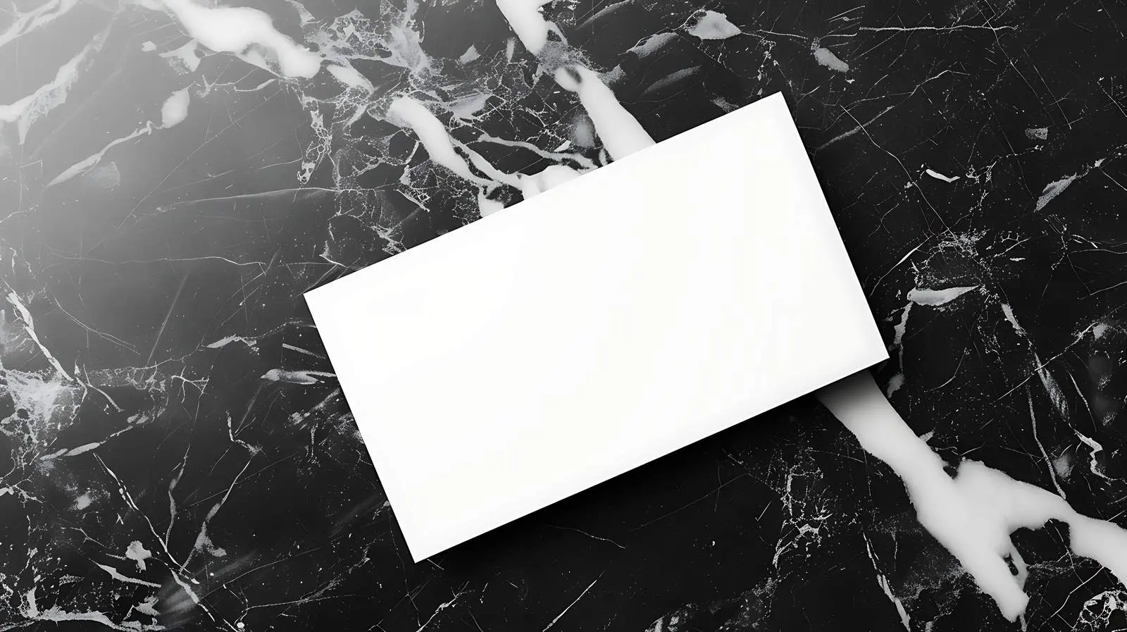 Blank Paper Sheet Mockup on Black Marble — free download from Dotvec