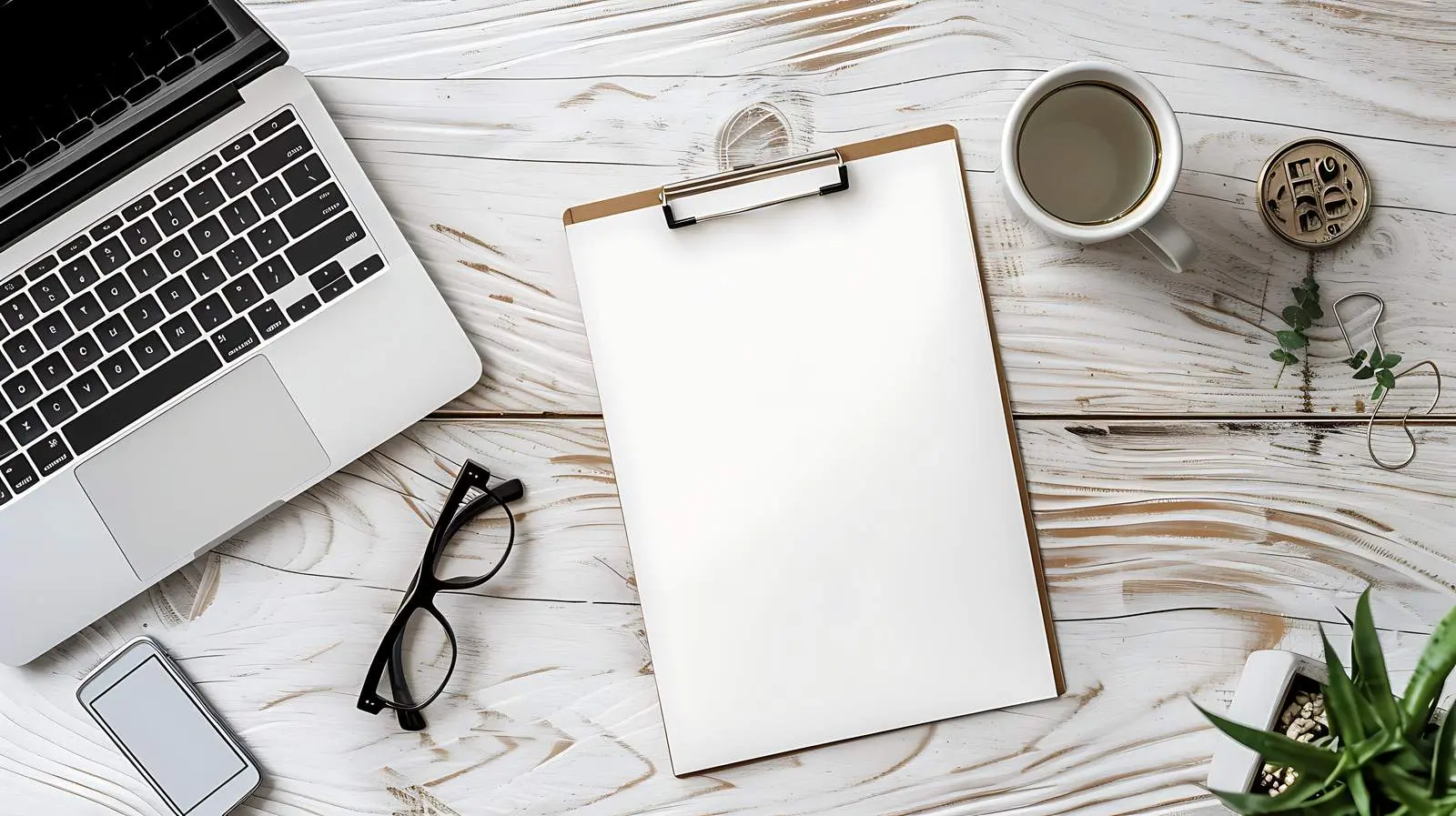 Blank Paper Sheet on Wooden Clipboard and Laptop — free download from Dotvec