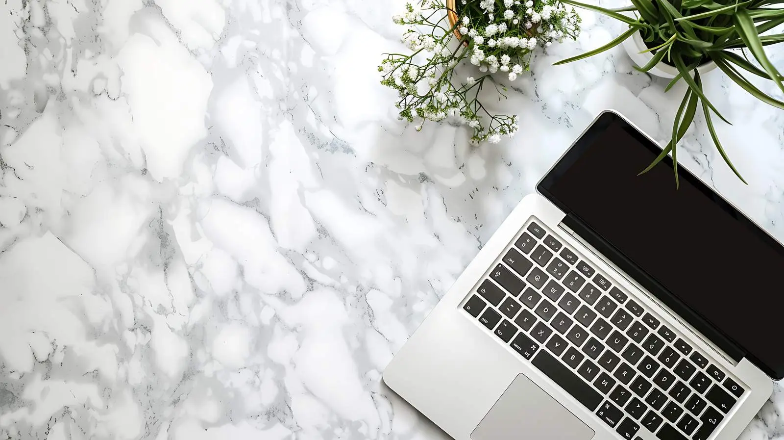 Blank Laptop on Marble Table Mockup — free download from Dotvec