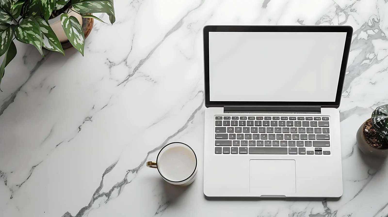 Laptop on Marble Table with Copy Space — free download from Dotvec