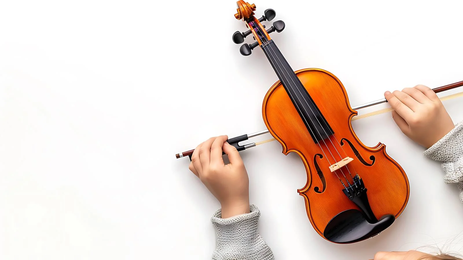 Young hands with violin and bow — free download from Dotvec