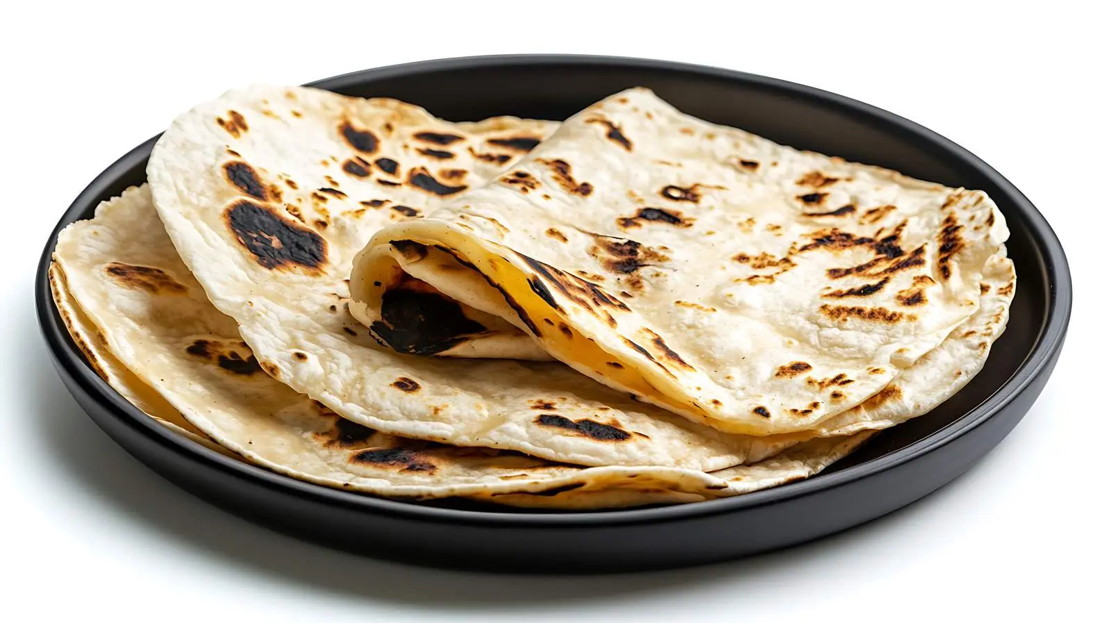 Freshly Baked Tortillas on Black Plate — free download from Dotvec