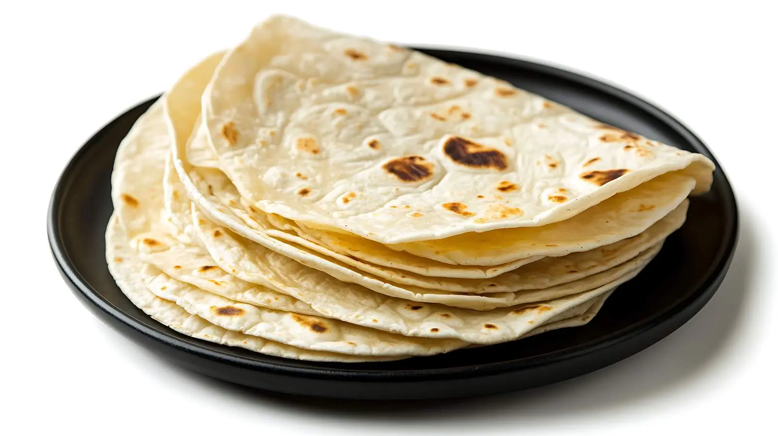 Close-up Tortillas on Black Plate — free download from Dotvec