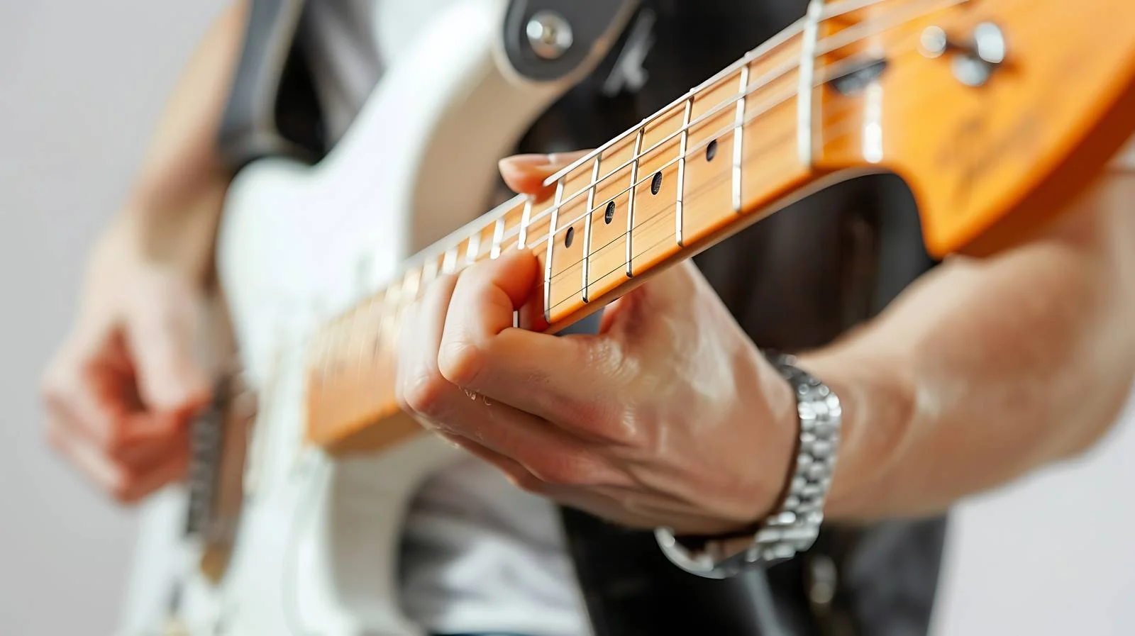 Close-up of Man Playing Guitar — free download from Dotvec