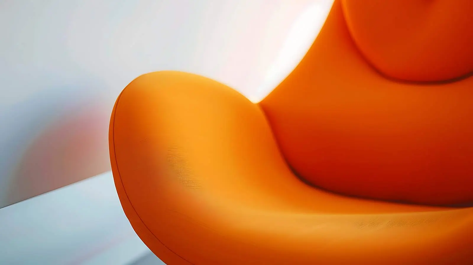 Closeup of Modern Orange Lounge Chair – free home comfort image from Dotvec