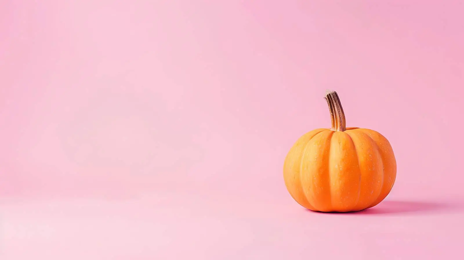Vibrant Halloween Pumpkin on Green Background – free object image from Dotvec