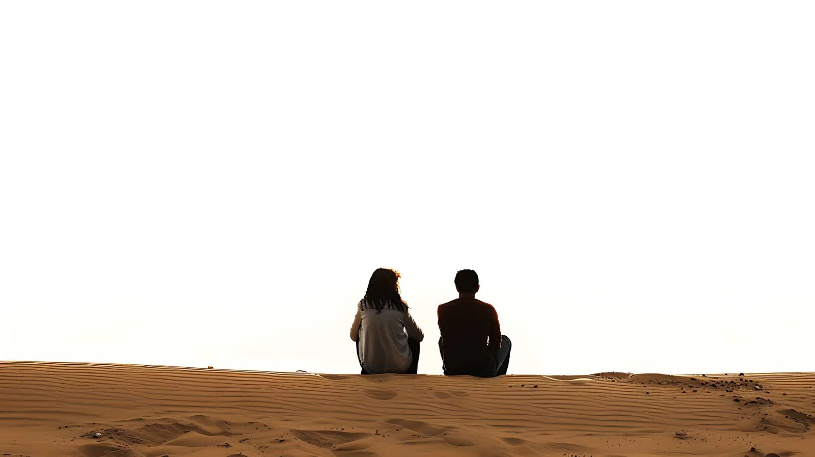 Serene Couple Sitting in Isolated Dunes — free download from Dotvec