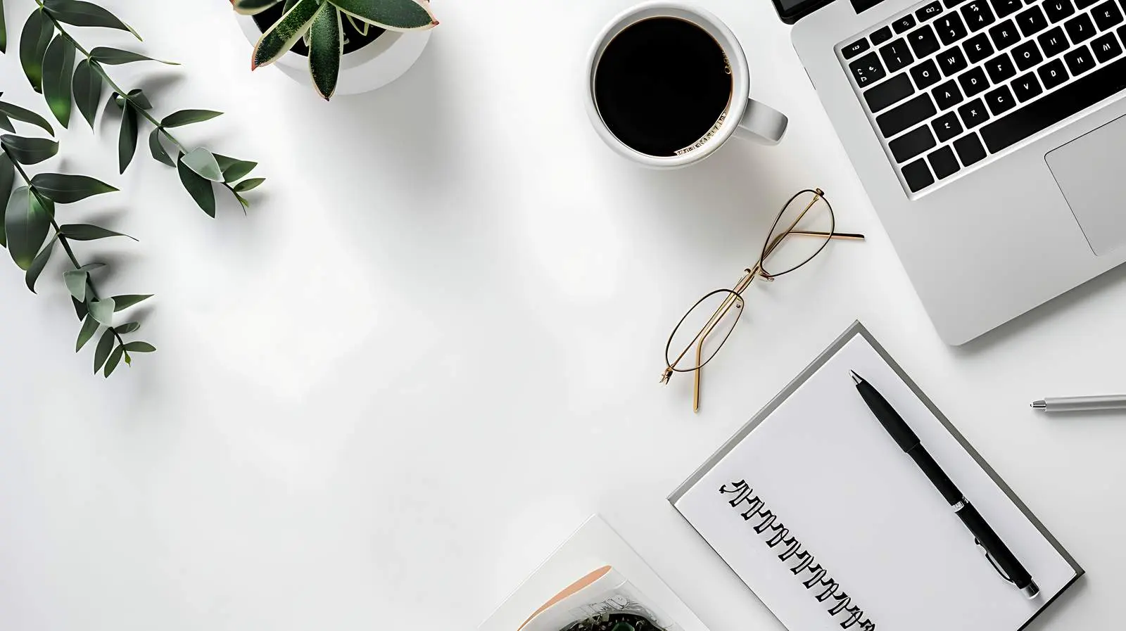 Creative Workspace Featuring Laptop and Notebook — free download from Dotvec