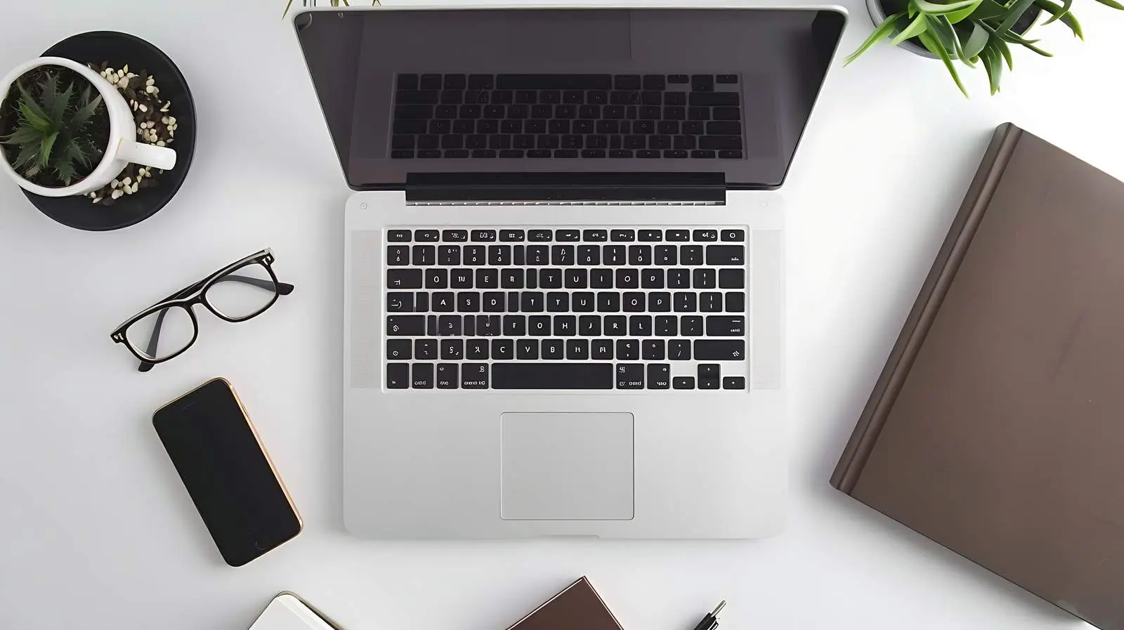 Creative Workspace with Laptop and Notebook – free tutorial image from Dotvec