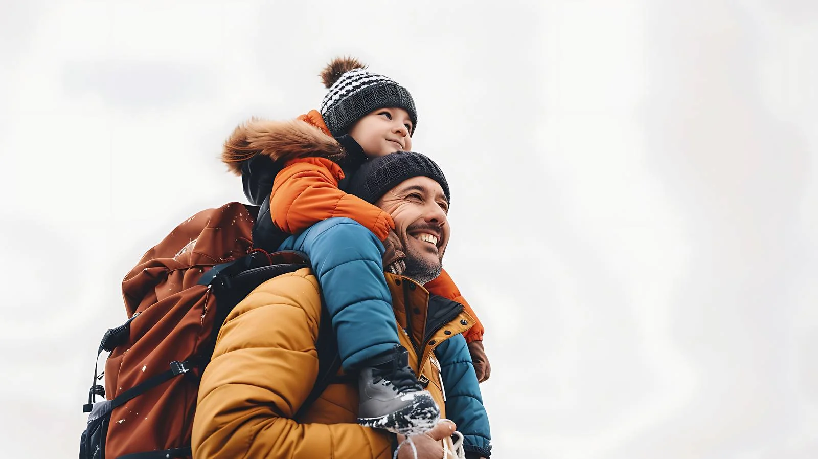 Father carries son on shoulders in nature — free download from Dotvec