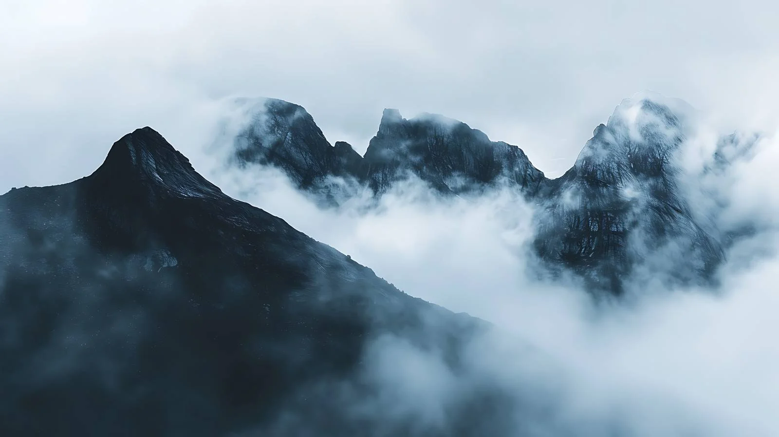 Majestic Norwegian Mountains Blanketed in Darkness — free download from Dotvec
