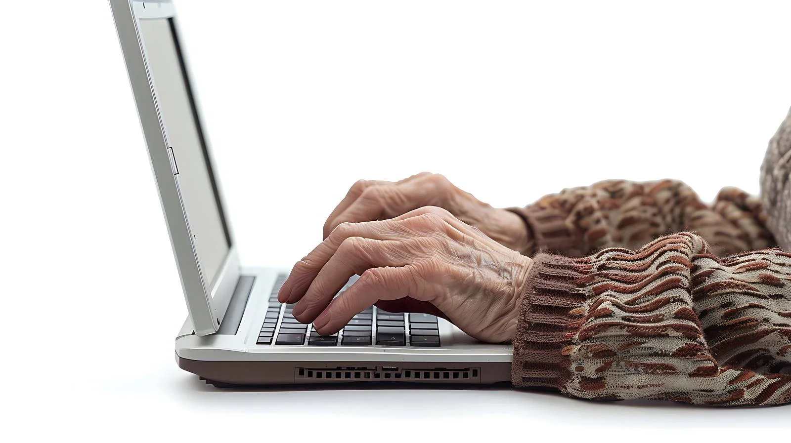 Senior Woman Typing on Laptop Keyboard — free download from Dotvec