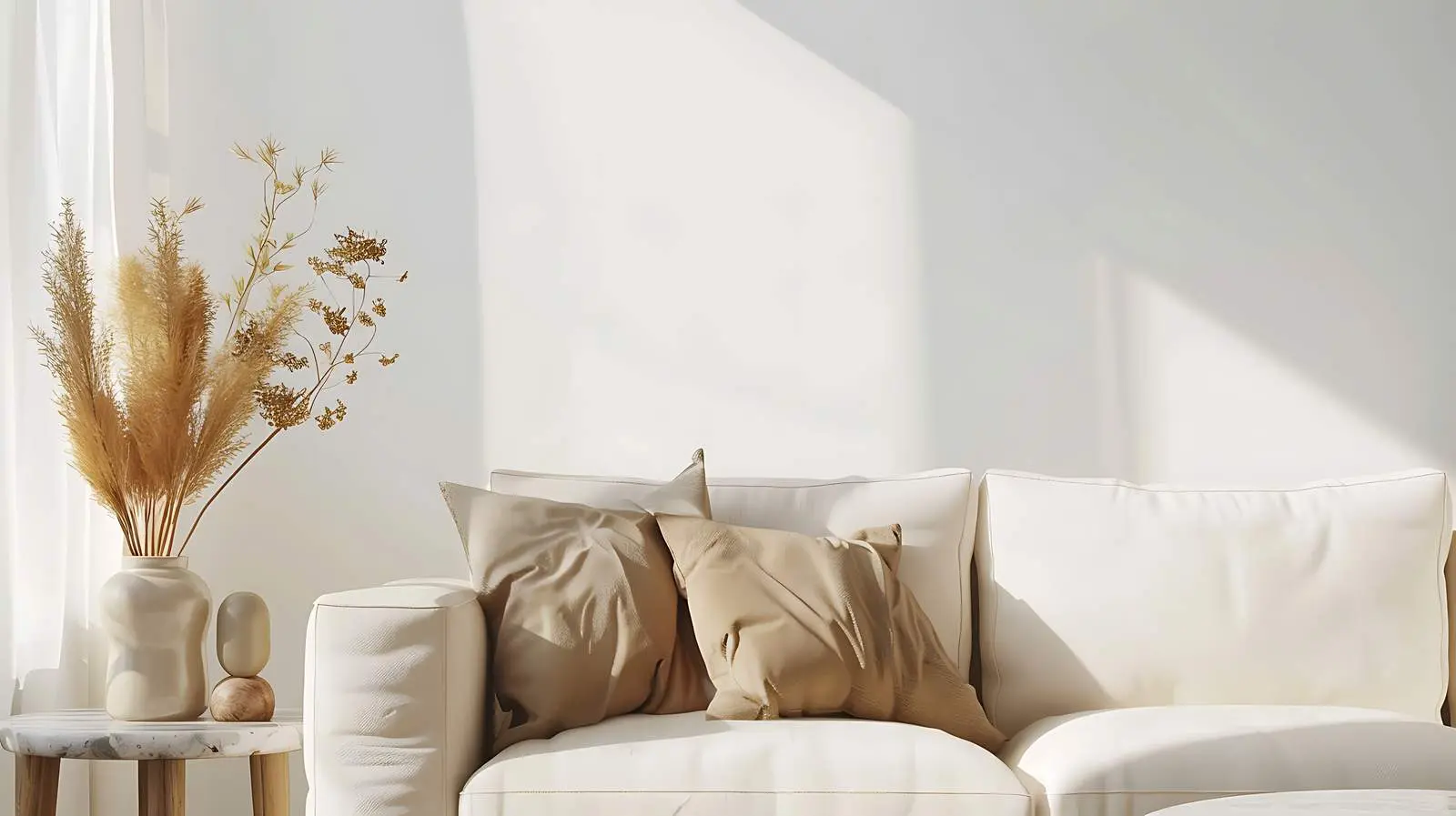 Elegant Sofa with Marble Side Table and Flowers – free thoughtful image from Dotvec