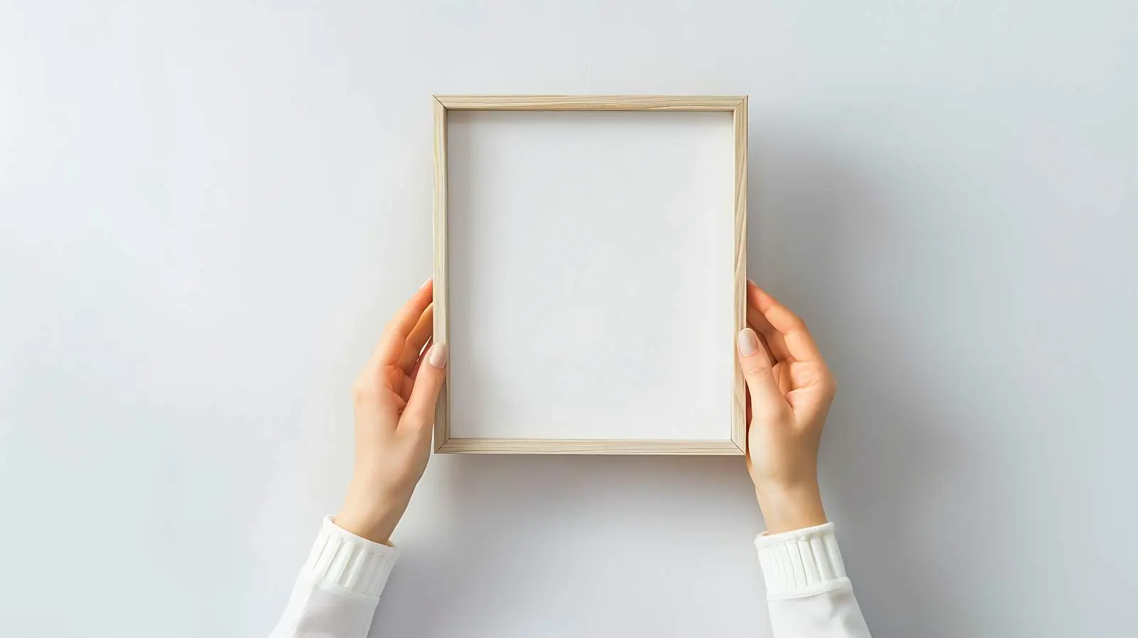 Female Hands Holding Blank Photo Frame Mockup – free suit image from Dotvec