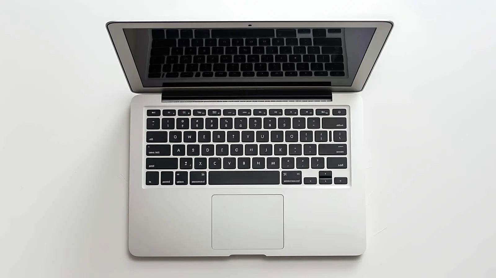 Flat Lay Top View of Laptop on White Background — free download from Dotvec