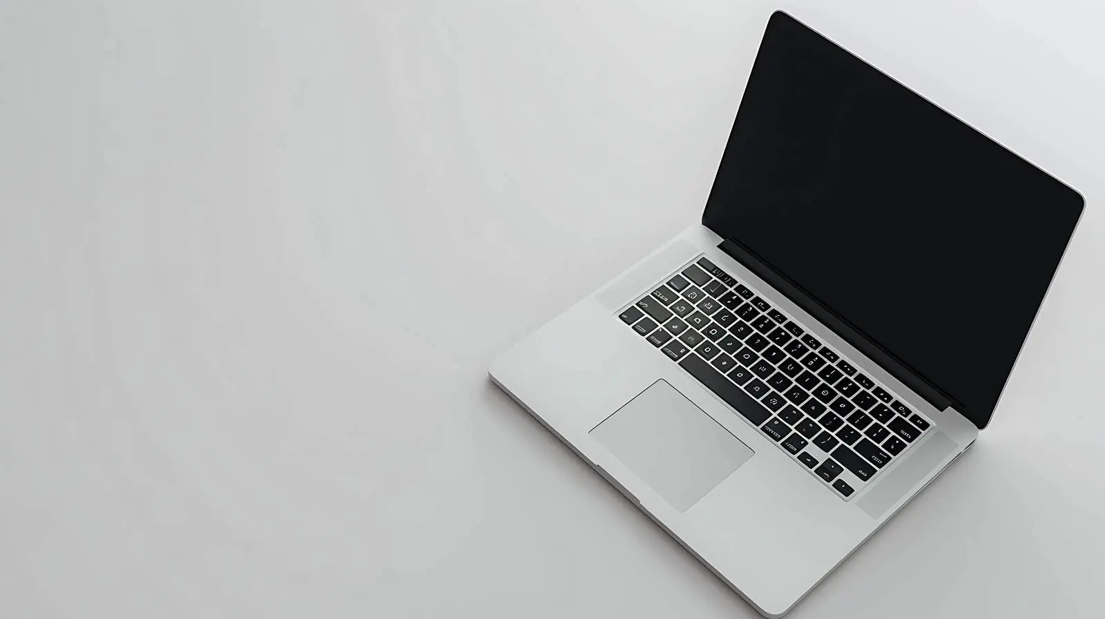 Closed Laptop on Neutral Background Flatlay – free mark image from Dotvec