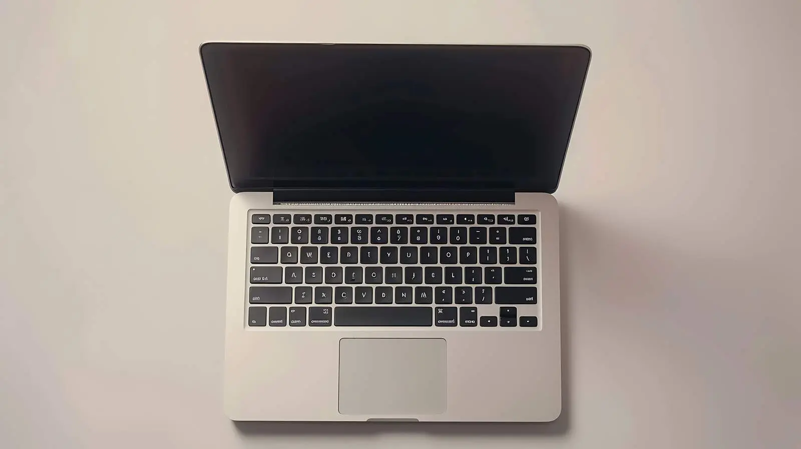 Closed Laptop Flatlay on Neutral Background – free mark image from Dotvec