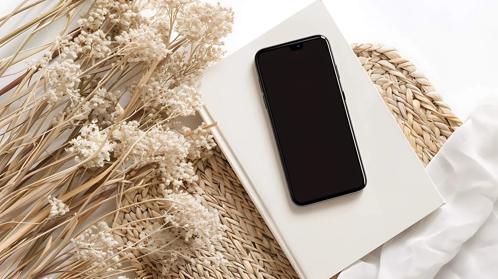 Flatlay of Mobile Phone with Dried Flowers — free download from Dotvec