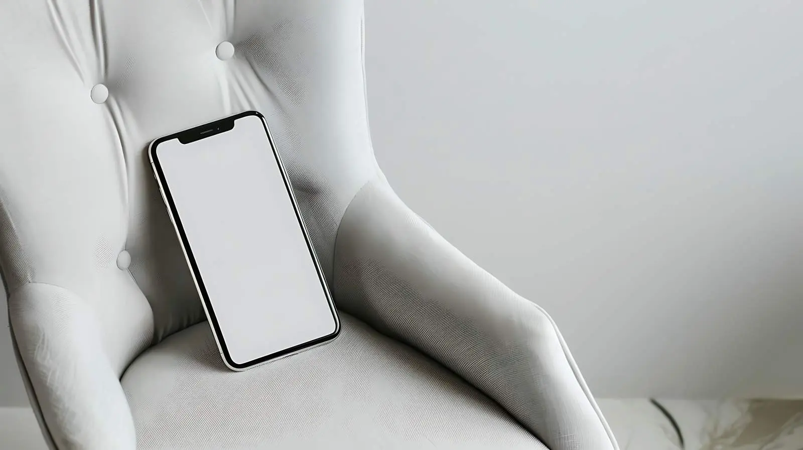 Aesthetic Flatlay of Mobile Phone on Chair – free pose image from Dotvec
