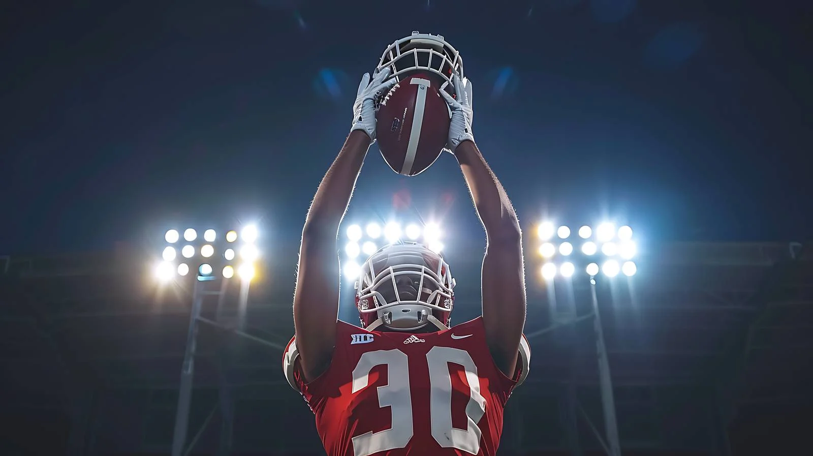 Athlete raising helmet in stadium celebration — free download from Dotvec