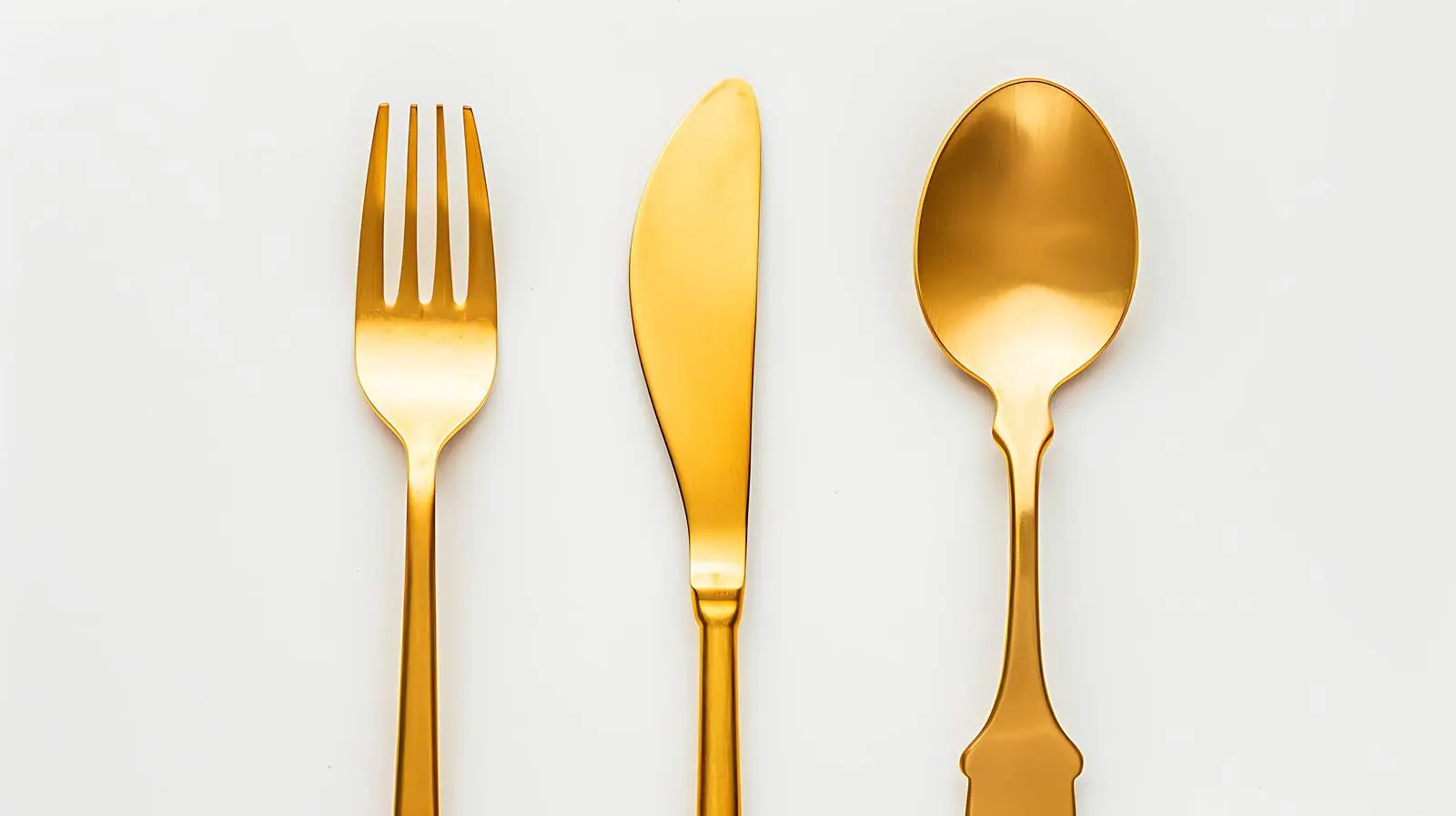 Golden Cutlery Set on White Background – free meal presentation image from Dotvec