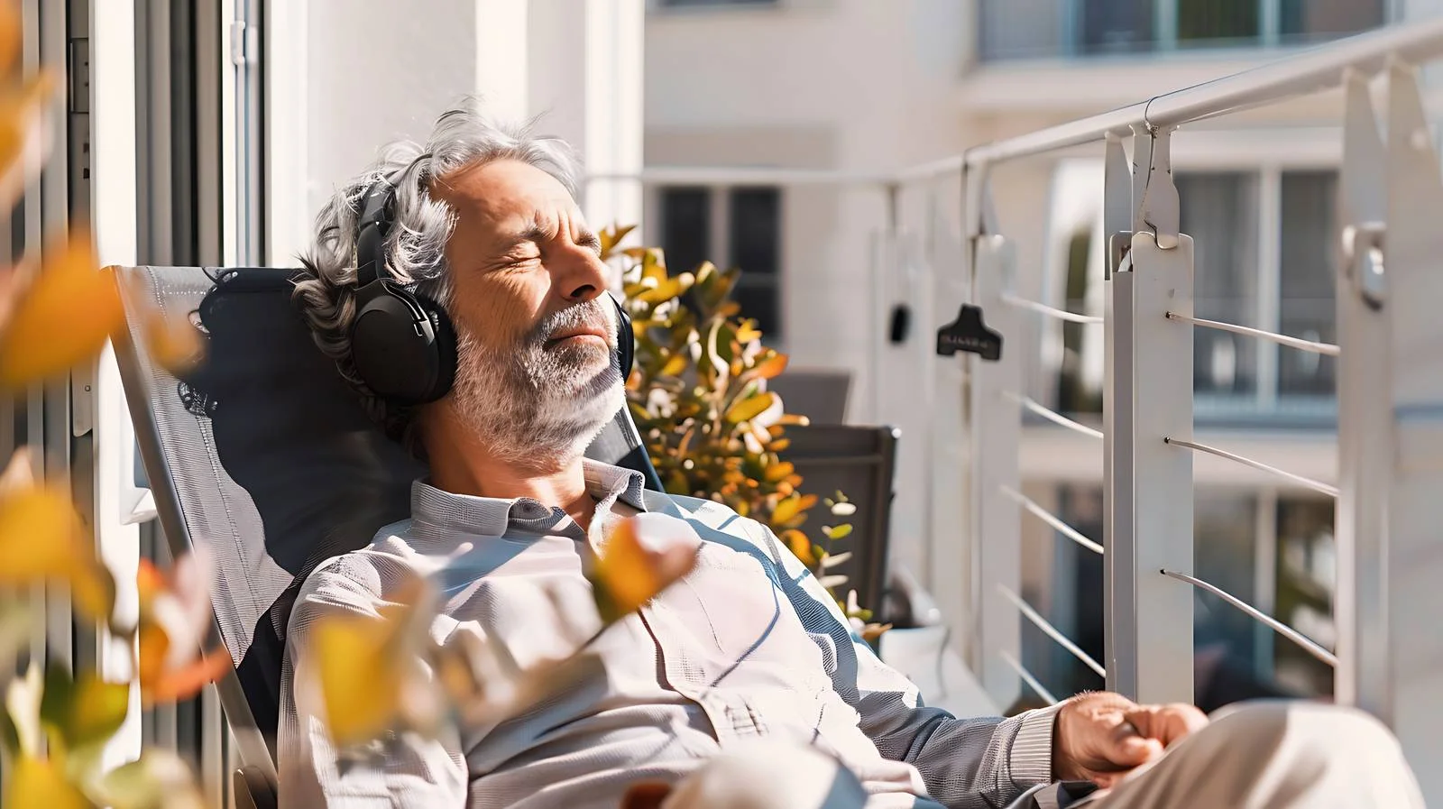 Serene Elderly Man Enjoying Balcony Moment — free download from Dotvec