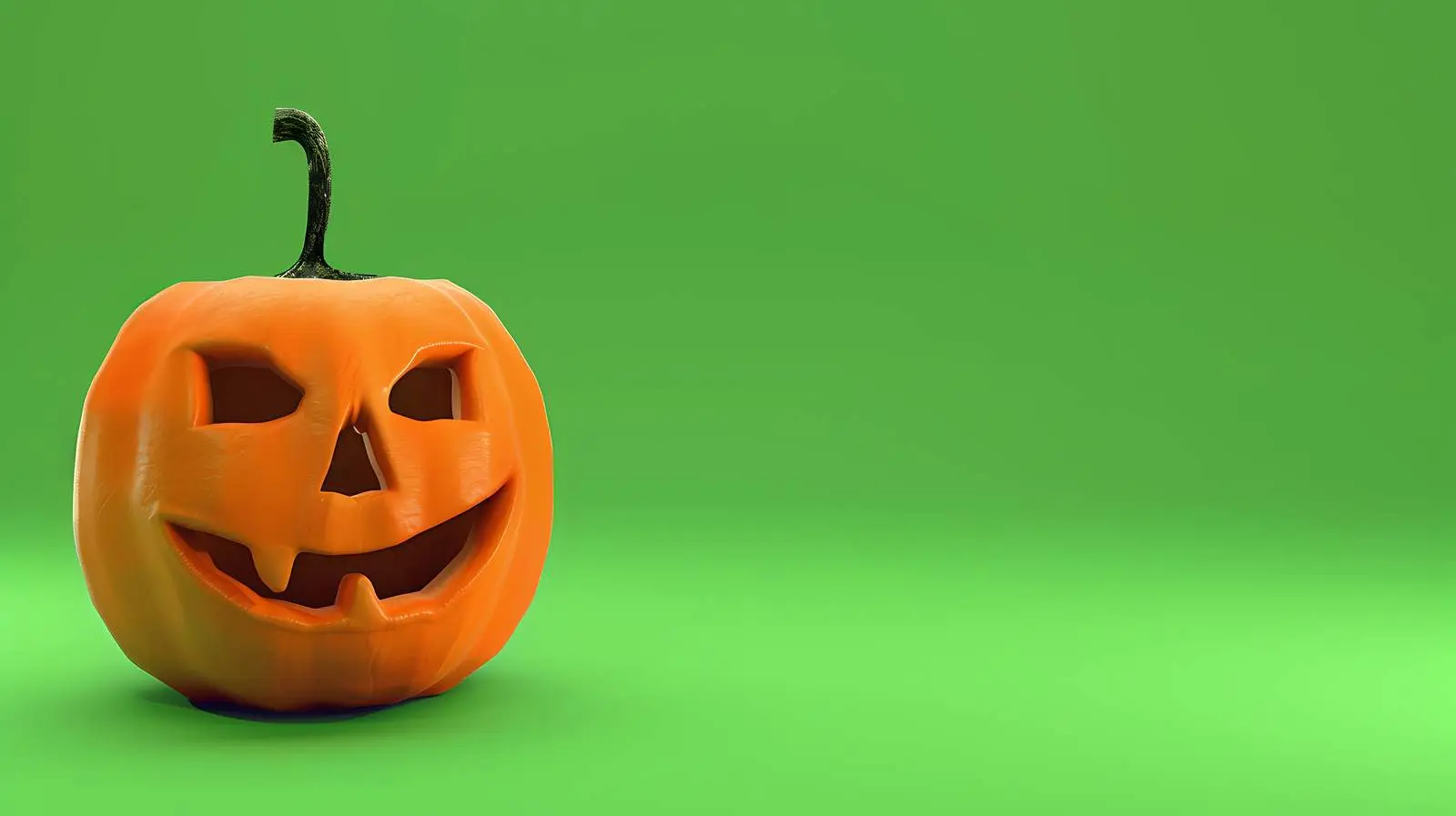 Halloween Pumpkin on Green Background — free download from Dotvec