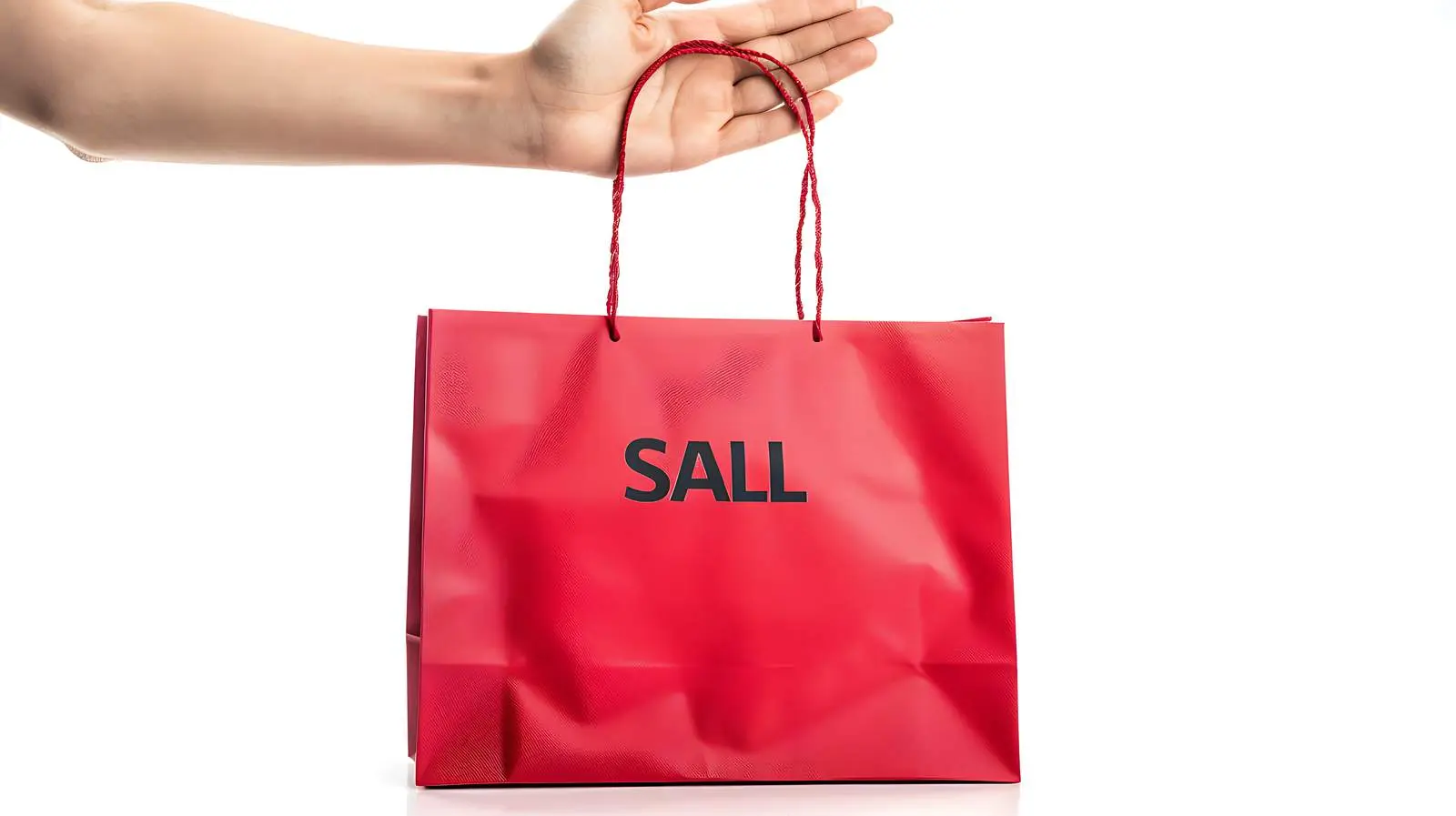 Hand Holding Red Craft Shopping Bag with Sign – free gift bag image from Dotvec