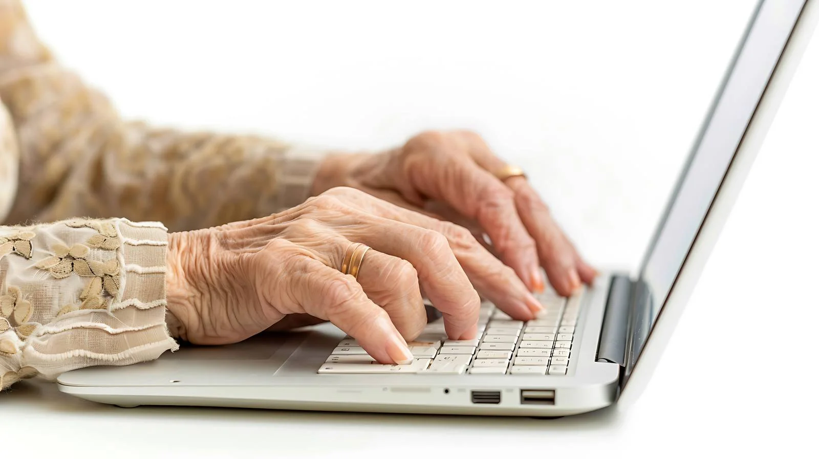 Senior Woman Typing on Laptop Keyboard — free download from Dotvec