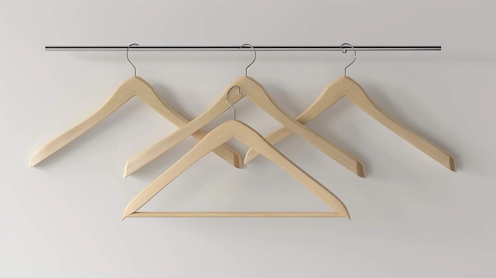 Hangers on Floor Against White Wall Background — free download from Dotvec
