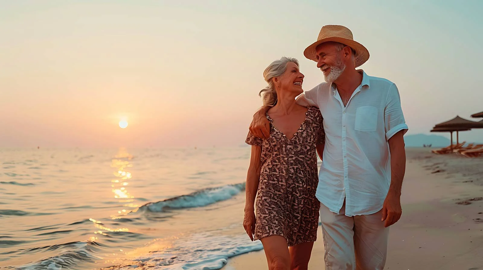 Joyful beach stroll of mature couple — free download from Dotvec
