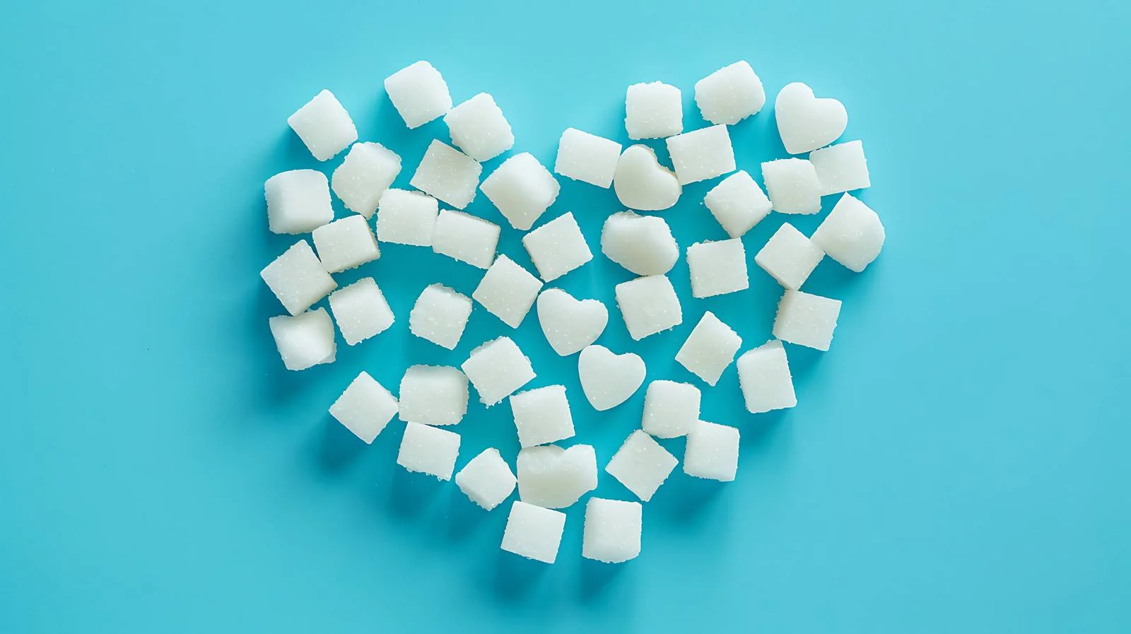 Sugar Heart on Blue Background — free download from Dotvec