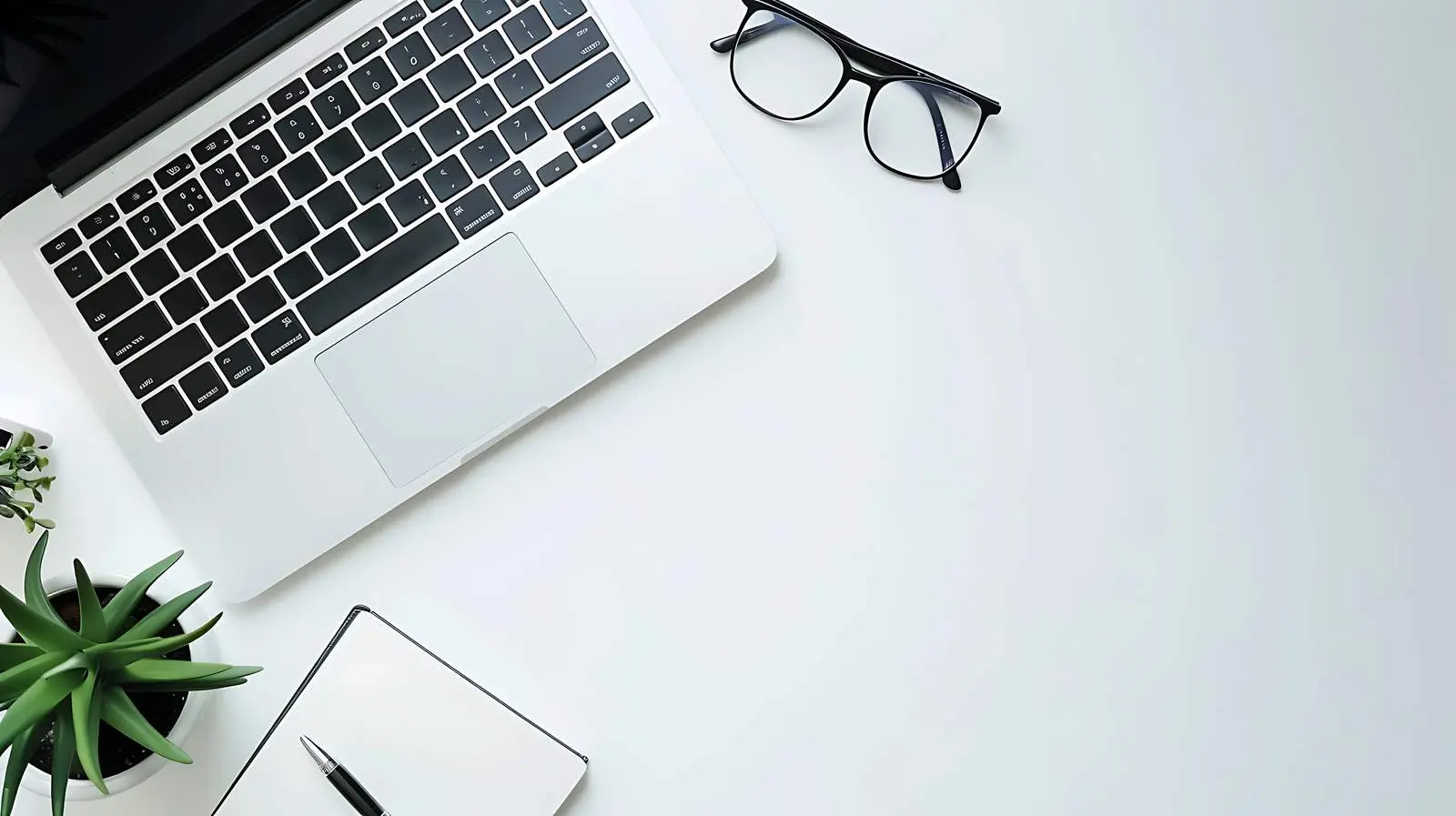 Home Office Desk Workspace with Laptop and Paper — free download from Dotvec